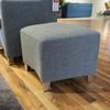 Leolux Calinda fauteuil met poef - Details