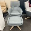 Leolux Lloyd Plus draaifauteuil met poef - Vooraanzicht